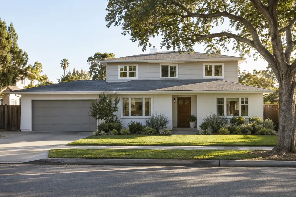 Single-story home with a matching second-story addition