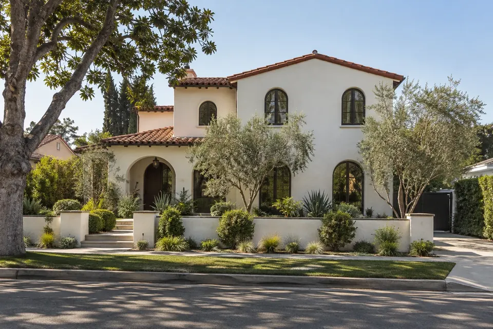 Design concept: Spanish Revival with the tile roofline carried up