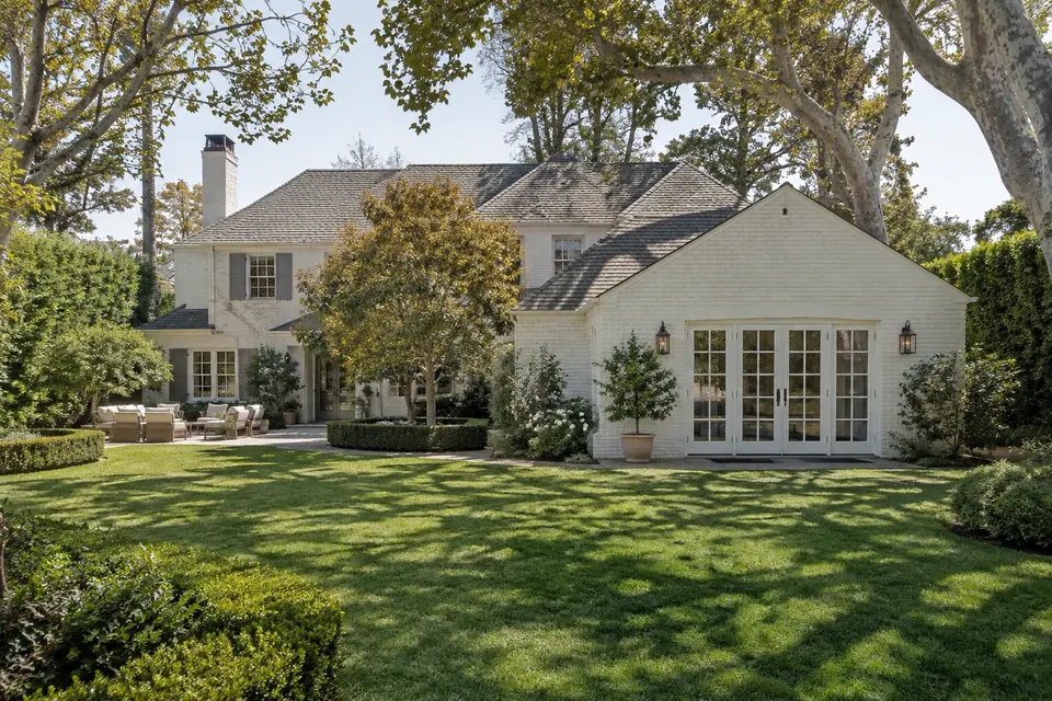 Illustration: traditional home with a new primary suite wing