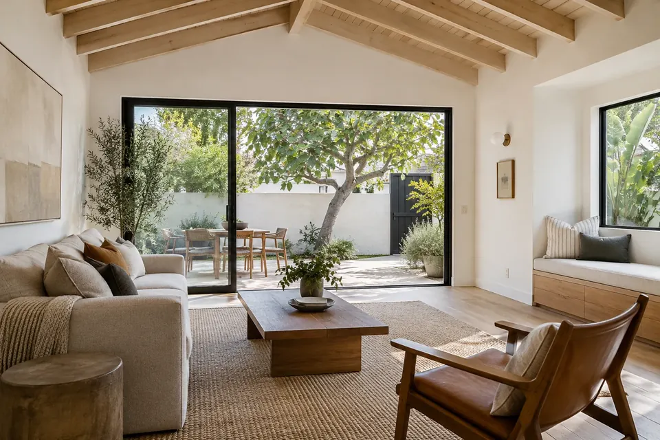 Illustration: beach bungalow opened to an indoor-outdoor living room